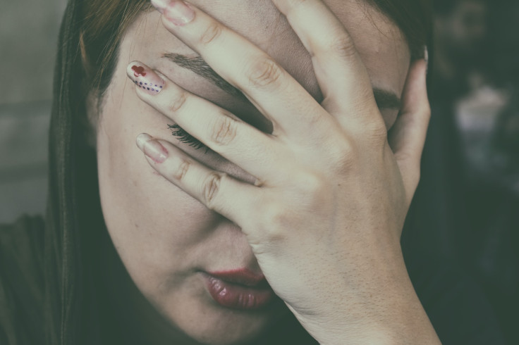 Representative image of a woman not feelingwell