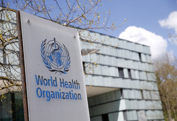 A logo is pictured outside a building of the WHO in Geneva