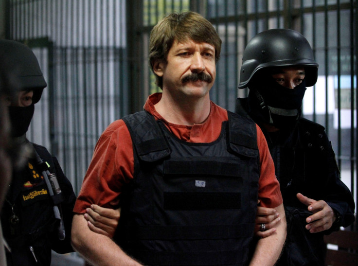 Suspected Russian arms dealer Viktor Bout is escorted by members of a special police unit after a hearing at a criminal court in Bangkok