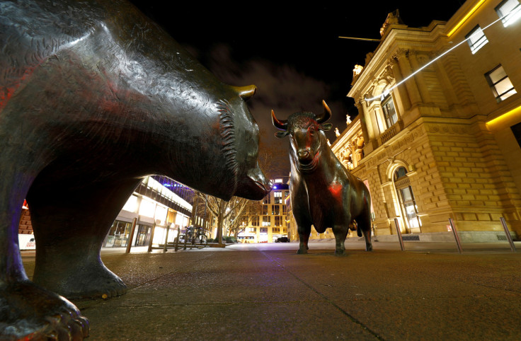 Bull and bear symbols for successful and bad trading are seen in front of the German stock exchange (Deutsche Boerse) in Frankfurt