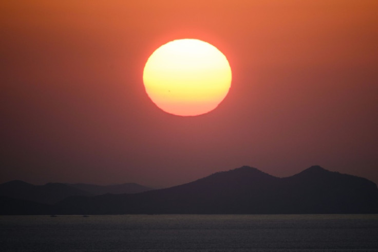 The sun is seen rising over North Korea's mainland on October 28, 2022