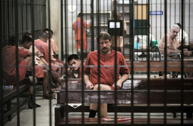 Russian arms dealer Viktor Bout behind bars ahead of a court hearing in Bangkok in 2009