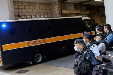 A prison van that is believed to carry media mogul Jimmy Lai, founder of Apple Daily, is seen on its way to the High Court in Hong Kong