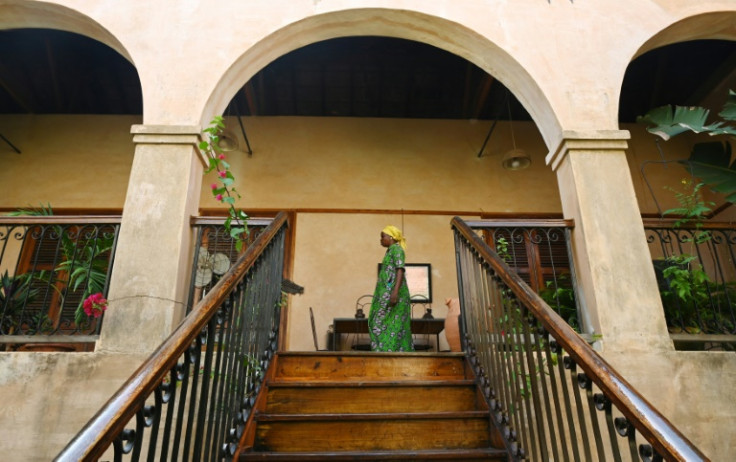 Local business magnate Amadou Diaw is buying up old, dilapidated houses to restore and transform them into museums