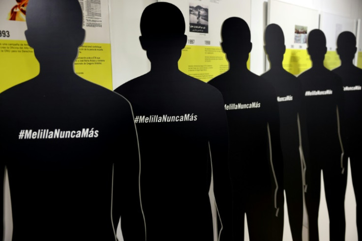 Amnesty said the Moroccan and Spanish security forces at the Melilla border had contributed to the deaths of 37 migrants, the victims represented here with black silhouettes marked: 'Melilla, never again'