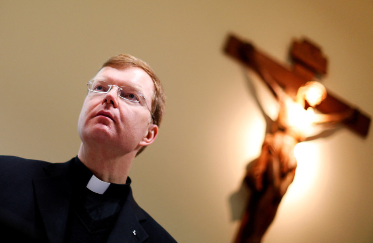 Father Hans Zollner, the Vatican's Chair of the Steering Committee of the Centre for the Protection of Minors, looks on as he attends a news conference at the Pontificial Gregorian University in Rome