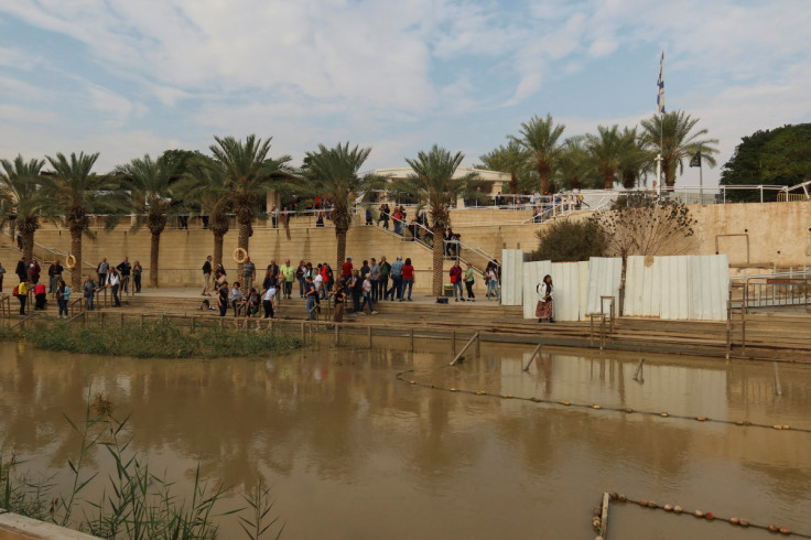 People gather at the Qasr el-Yahud site, near Jericho, in the Israeli-occupied West Bank, as pictured from the Jordan Valley