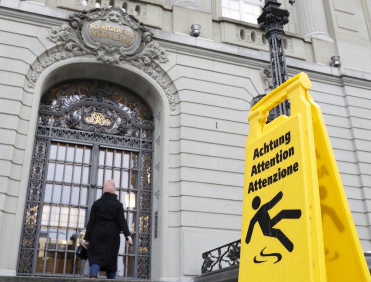 A sign is placed in front of the Swiss National Bank in Bern