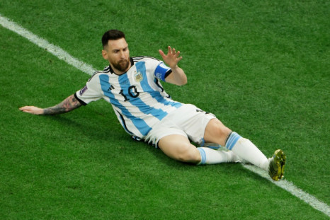 Lionel Messi celebrates after putting Argentina ahead from the penalty spot