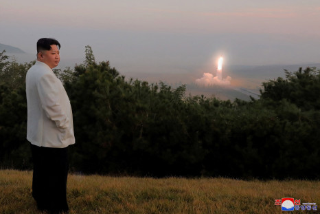 North Korea's leader Kim Jong Un oversees a missile launch at an undisclosed location in North Korea
