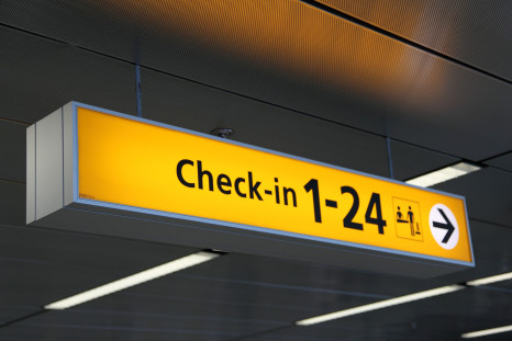 An airport check-in sign