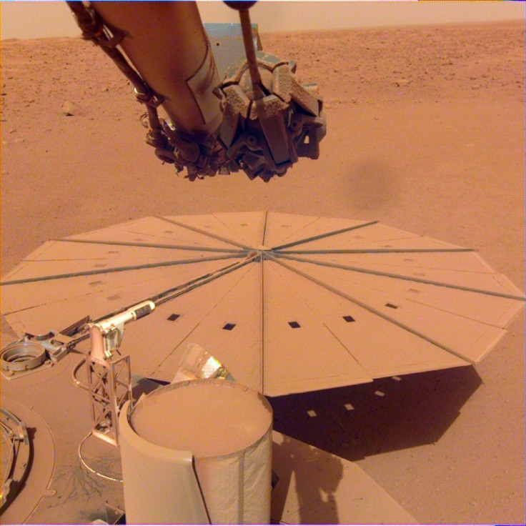 NASA's InSight Mars lander of one of its dust-covered solar panels in April 2022