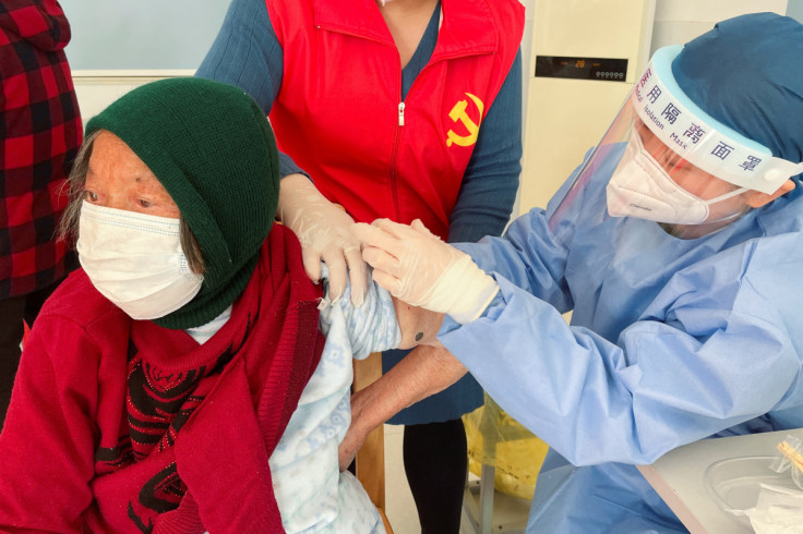 Coronavirus disease (COVID-19) vaccination to elderly people at a vaccination center on the outskirts of Shanghai