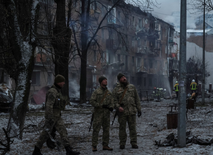 Rescuers work at a site of a residential building destroyed by a Russian missile attack in Vyshhorod