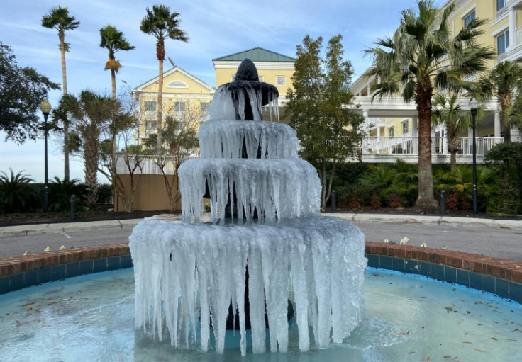 Ice adorns a fountain in Charleston, South Carolina, on December 24, 2022, as a deadly winter storm blanketed much of the United States with frigid temperatures, fierce winds and blinding snow