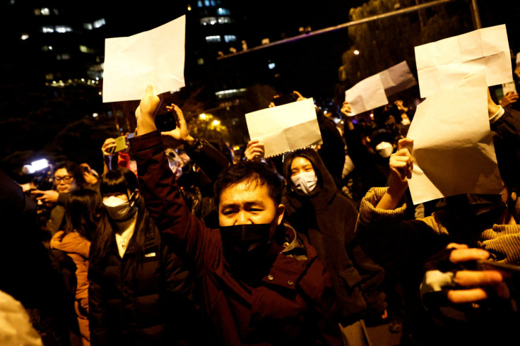 Vigil commemorating victims of a fire in Urumqi, in Beijing