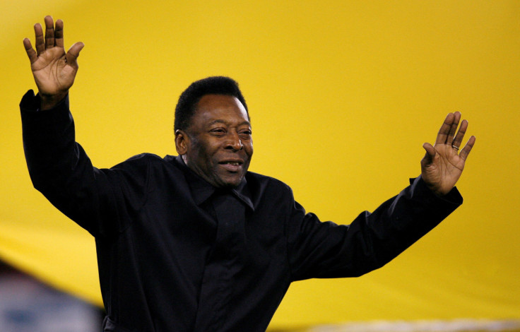 Former Brazil soccer player Pele greets the crowd before the international friendly soccer match between Sheffield FC and Inter Milan at Bramall Lane, Sheffield