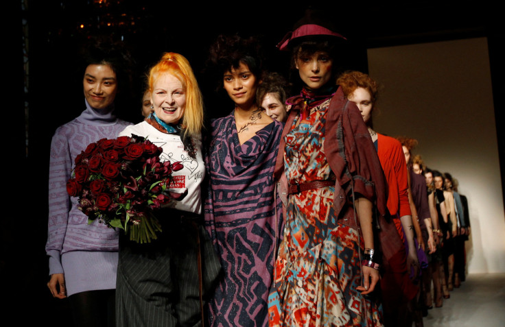 Designer Westwood poses on the catwalk with her models after the presentation of her Vivienne Westwood Red Label 2012 Autumn/Winter collection during London Fashion Week