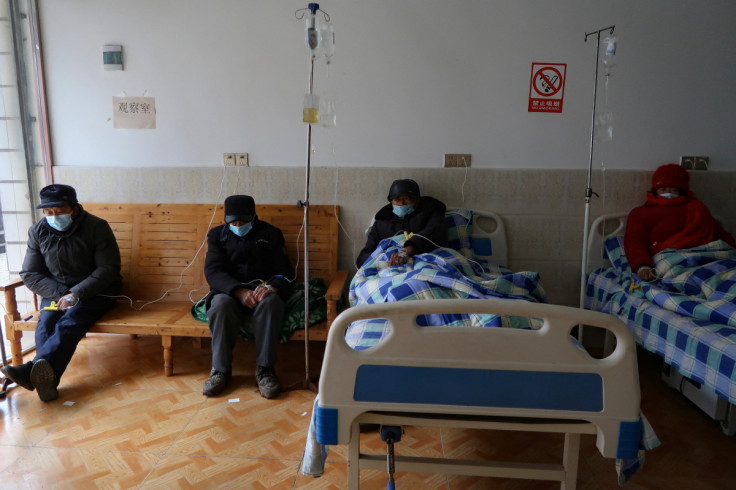 Patients at a clinic in Lezhi county
