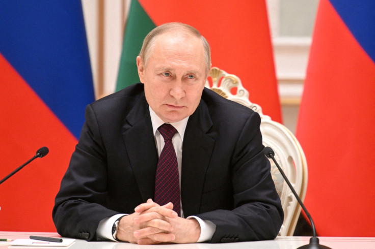 Russian President Vladimir Putin attends a news conference in Minsk