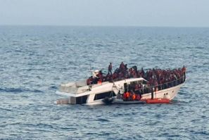 A photo provided by the Lebanese Army shows the distressed migrant boat in Mediterranean waters off the country's northern coast