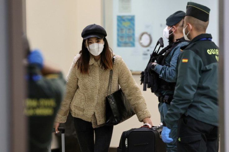 Passengers on the Air China CA 907 flight to Spain had to undergo a series of health controls after rules were imposed on visitors from China