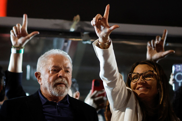 Brazil's former President and presidential candidate Luiz Inacio Lula da Silva stands next to his wife Rosangela da Silva, in Sao Paulo
