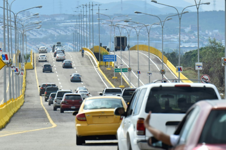 Vehicles cross the Atanasio Girardot bridge after the Venezuela and Colombia officially reopened their shared land border, on January 1, 2023