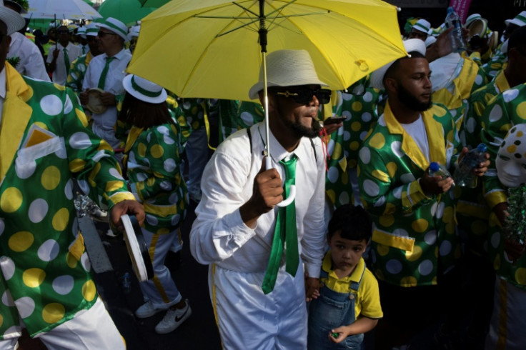 About 20,000 performers marched in the city centre while playing music and dancing