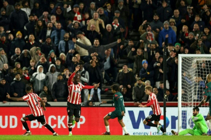 Brentford's Yoane Wissa (2L) scores against Liverpool