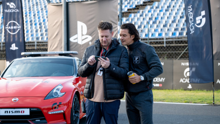 Director Neill Blomkamp and Orlando Bloom on the set of Columbia Pictures 'Gran Turismo'