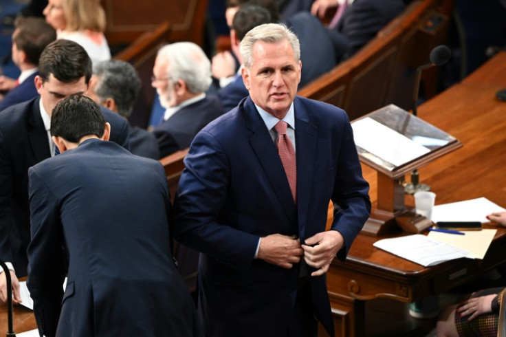 Republican U.S. Representative Kevin McCarthy listens to the United States House of Representatives meeting for the 118th Congress at the U.S. Capitol in Washington, DC on January 3, 2023