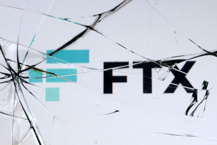 Illustration shows FTX logo and broken glass