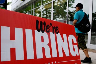 US private hiring grew more than expected in December with the labor market still strong despite rising interest rates