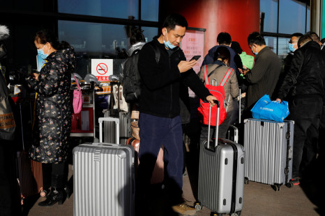 Travellers arrive at Beijing Capital International Airport