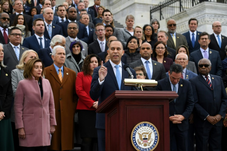 US Democratic Representative of New York, Hakeem Jeffries, speaks as he is joined by a bipartisan group of lawmakers on the east front steps of the US Capitol to honor the police officers who lost their lives in the attack on the Capitol