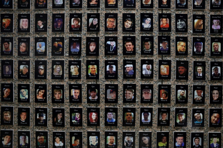 Photos of fentanyl victims are displayed at the US Drug Enforcement Administration headquarters in Arlington, Virginia
