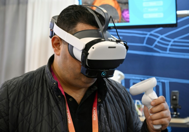 A man at CES tests OVR Technology's ION 3, which emits odors when a user interacts with items in a VR environment