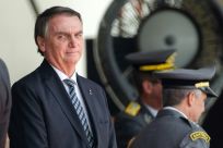 Brazil's defeated former president, Jair Bolsonaro, waited hours before urging calm during riots by his supporters in Brasilia