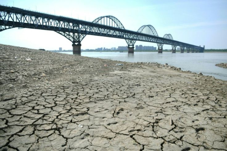 Commercial traffic along rivers in Europe and China -- as in this photo of the Yangtze River -- were disrupted by drought in 2022