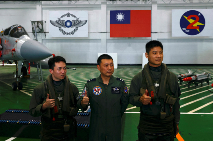 Lieutenant Colonel Wu Bong-yeng poses for a photo at an airbase in Hsinchu