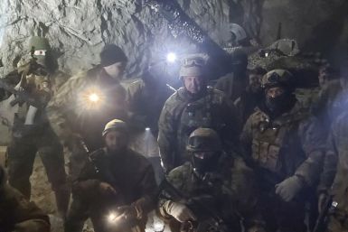 People in military uniform, claimed to be soldiers of Russian mercenary group Wagner pose for a picture believed to be in a salt mine in Soledar