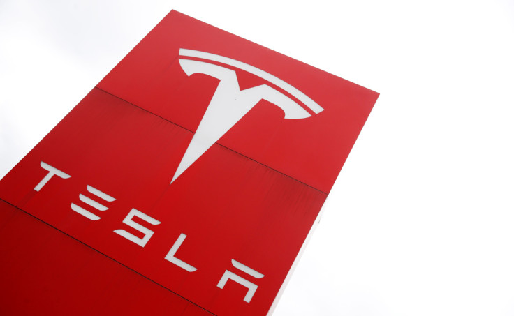 The logo of car manufacturer Tesla is seen at a dealership in London