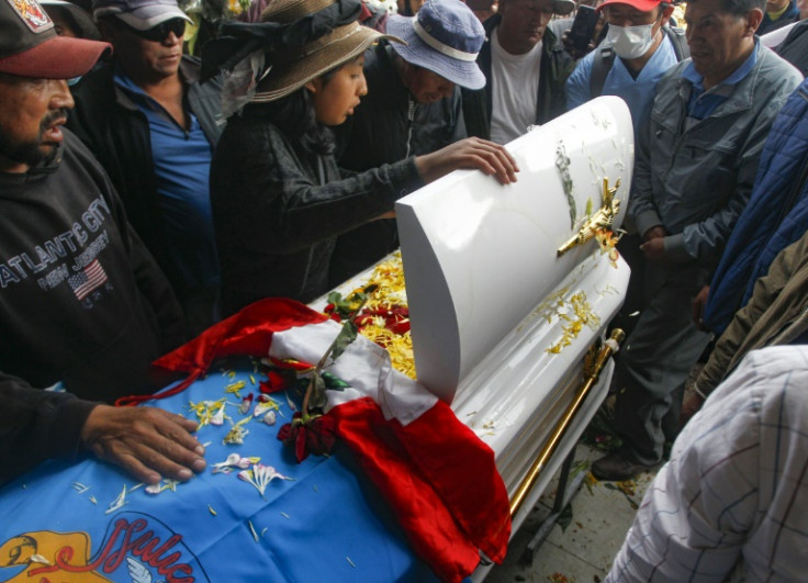 Mourners attend the burial of 17-year-old student Jamilath Aroquipa, one of the 17 killed during violent clashes between protesters and security forces in southern Peru
