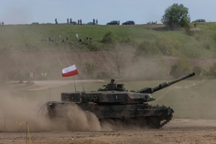 Poland says it is willing to send Kyiv 14 advanced Leopard 2 battle tanks