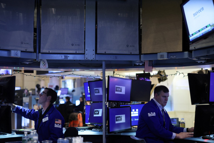 Traders work on the trading floor at the New York Stock Exchange (NYSE) in New York City