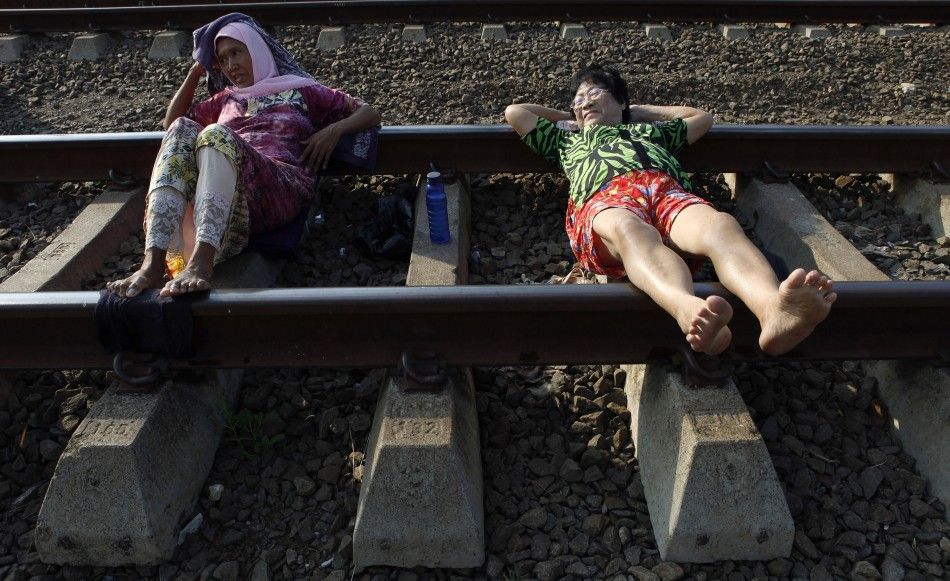 Railway Therapy in Indonesia Lie on the tracks