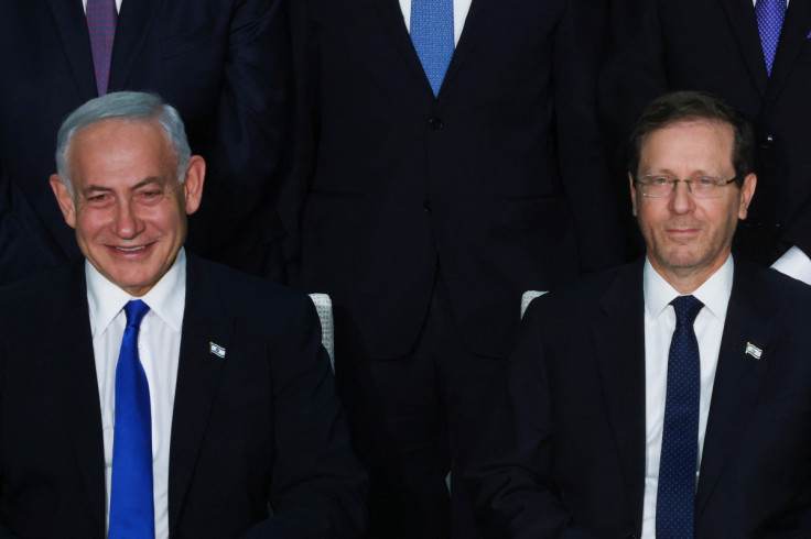 Israel's new far-right government pose for a group photograph, in Jerusalem