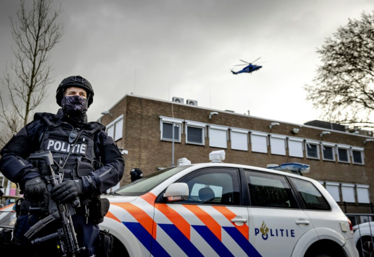 A Dutch police marksman guards the court were suspected drug baron Ridouan Taghi is on trial in Amsterdam
