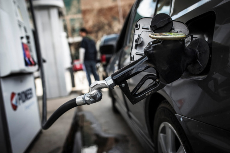 A fuel pump is seen in a car at a gas station in Toronto